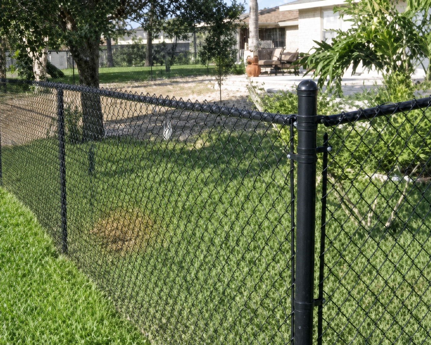 Black chain link fence installation