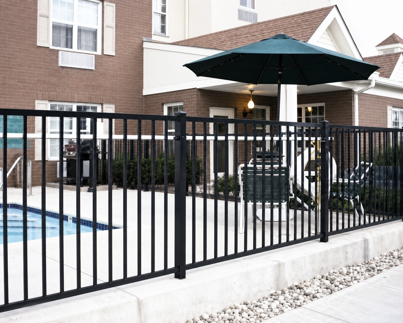 Pool enclosure fence installation